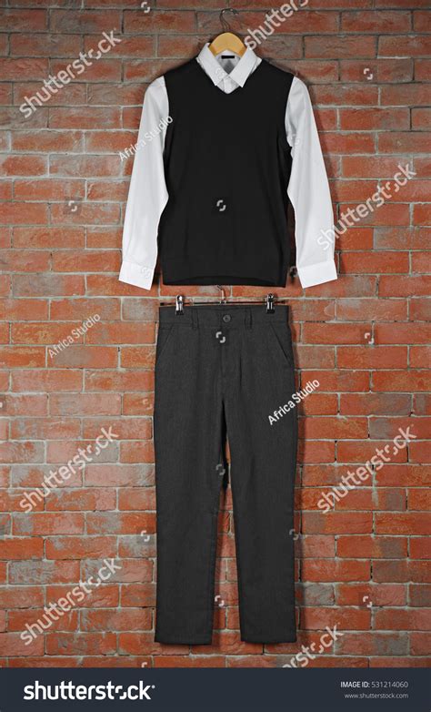 School Uniform On Brick Wall Background Stock Photo 531214060 ...