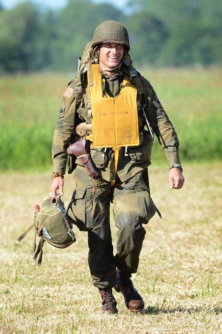 A French paratrooper donning a vintage American World War II ...