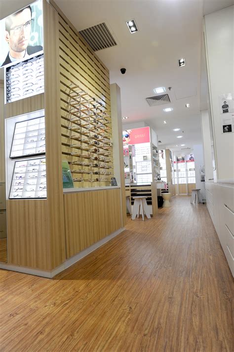 NANYANG Optical Shop Interior Design - by ADA Builders Pte Ltd