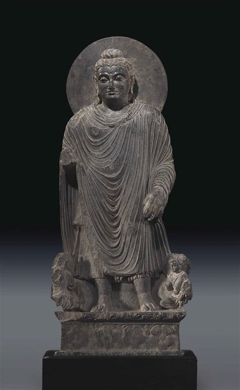 A Gray Schist Figure of a Standing Buddha , GANDHARA, 2ND/3RD CENTURY | Christie's