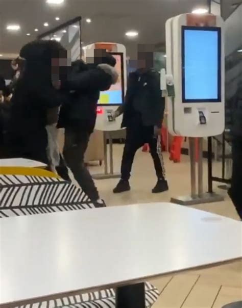 Shocking moment wild brawl breaks out inside McDonald's in front of ...