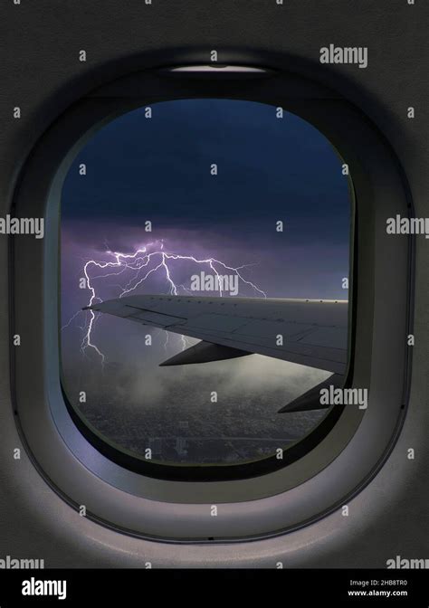 Thunderstorm and lightning view from airplane window Stock Photo - Alamy