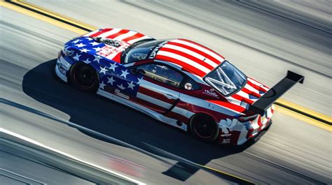 American flag racing car, patriotic car design, race track speed blur ...