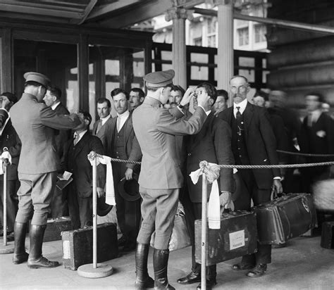 Health inspection for new immigrants, Ellis Island, New York, 1920 ...