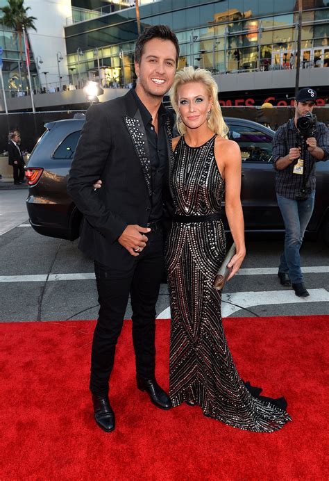 Luke Bryan and his wife, Caroline, sparkled. | Stars Hit the AMAs Red Carpet | POPSUGAR Celebrity