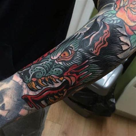 Old school colored bloody hell dog tattoo on forearm - Tattooimages.biz