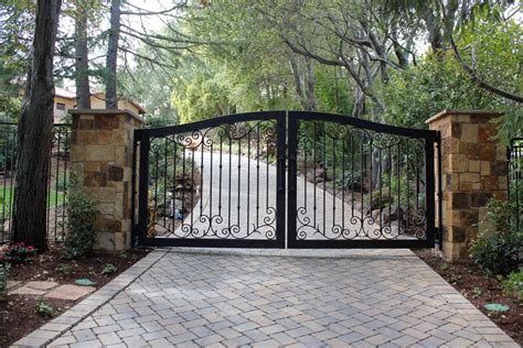 Automatic ornamental iron driveway gates - Mediterranean - Landscape ...