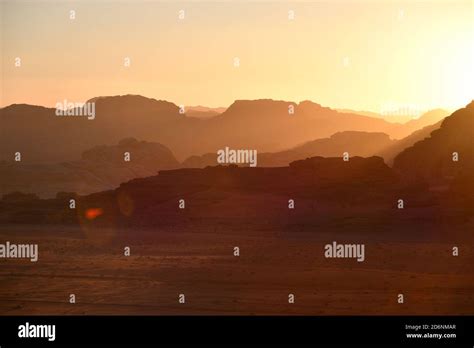 Sunset in desert Wadi Rum Stock Photo - Alamy