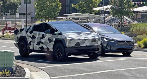 Cybertruck spotted vs. Model X and on freeway soaking up bumps with air ...