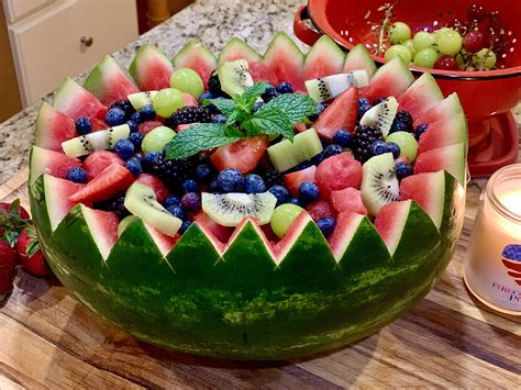 Easy Carved Watermelon Bowl With Fruit Salad is Fun and Festive for any Occasion this Summer!