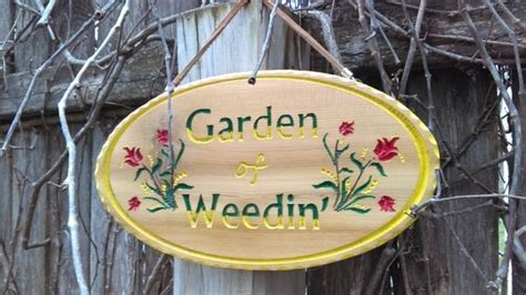 Whimsical Garden of Weedin' sign. Outdoor