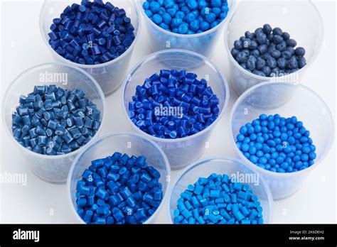 different blue plastic resin granulates for injection moulding process in different granulate ...