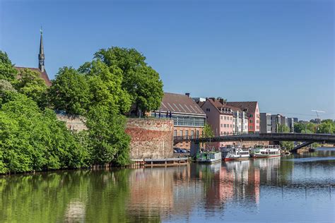 Colorful buildings and ships at the Fulda river quay in Kassel Photograph by Marc Venema