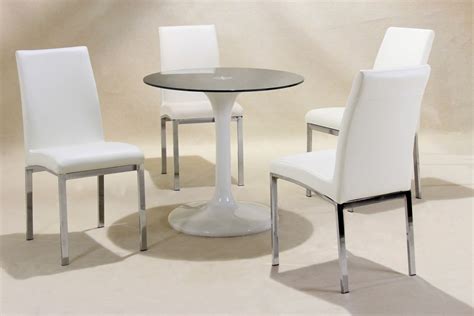 Small round white high gloss glass dining table and 4 chairs