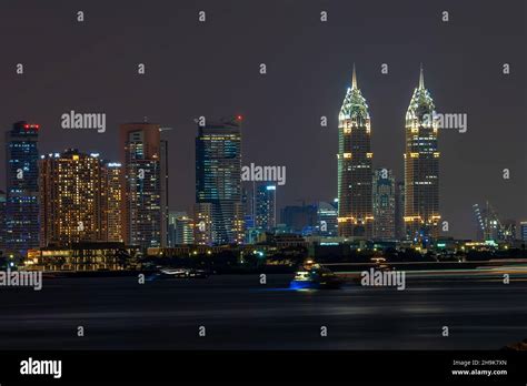 Dubai Skyline after sunset Stock Photo - Alamy