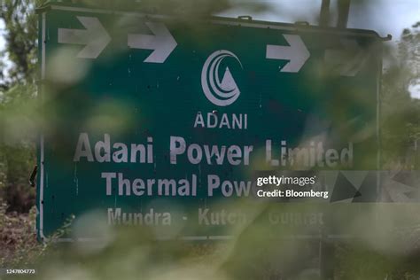 Signage of the Mundra Thermal Power Plant of Adani Power Ltd., sit on ...