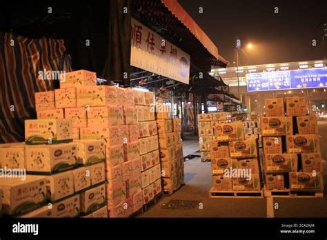 the fruits are packed in Yau Ma Tei Wholesale Fruit Market at night ...