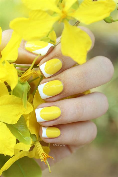 Yellow French Nails. Tip: if you want to get perfect smile line for your French manicure, use ...