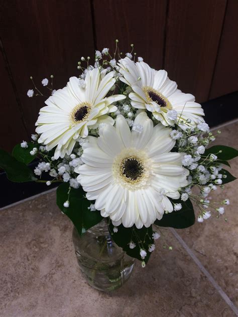 White gerbera daisy bouquet with baby's breath and greens by #SunshineFlorist | Sunshine Designs ...