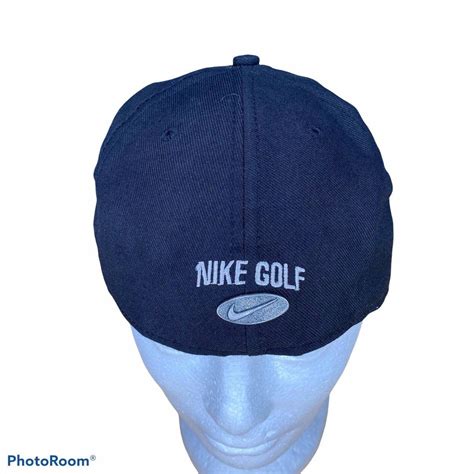 This vintage Nike golf hat is in used condition with... - Depop