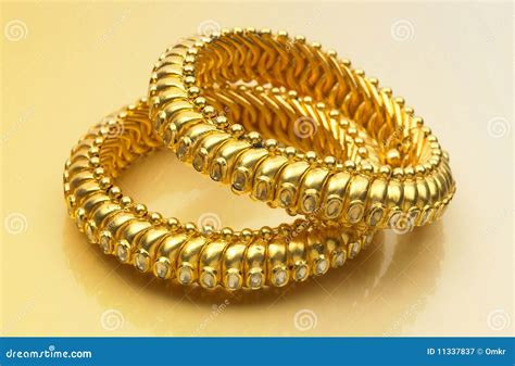 Gold bangles stock image. Image of accessory, handmade - 11337837