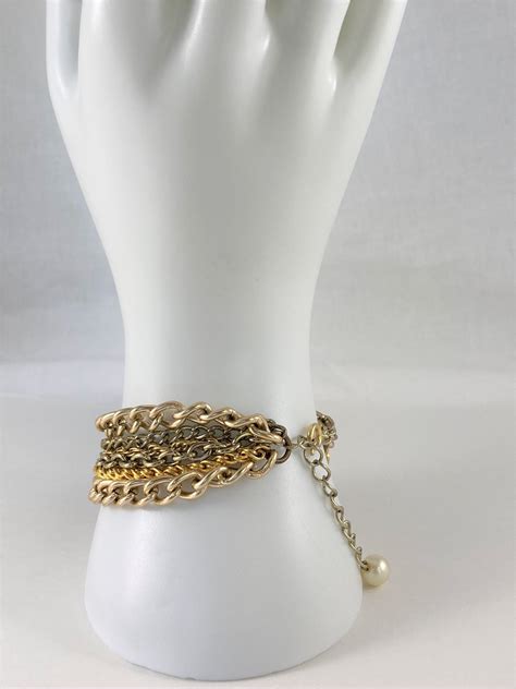 Gold and brass multi-chain bracelet layered chain bracelet - Etsy Italia