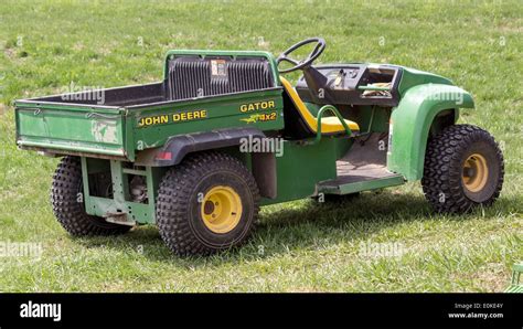 John Deere Gator four wheeler ATV with dump Stock Photo - Alamy