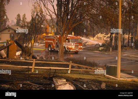 San Diego Fire-Rescue Engine 12's crew douses hot spots at the Cedar Fire in San Diego ...