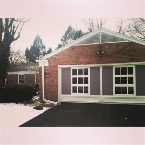 1962 L-Shape brick ranch. Signature style of garage doors. Built on a ...