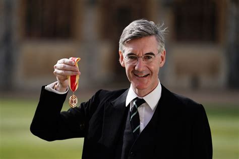 Jacob Rees Mogg receives knighthood joined by family as Priti Patel ...