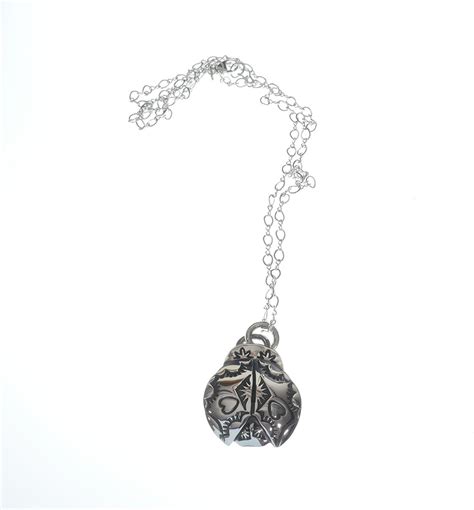 Native American Jewelry Sterling Silver Stamped Ladybug Pendant Geri Arviso – Home & Away Gallery