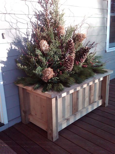 Planter box with winter arrangement | Field Outdoor Spaces | Flickr