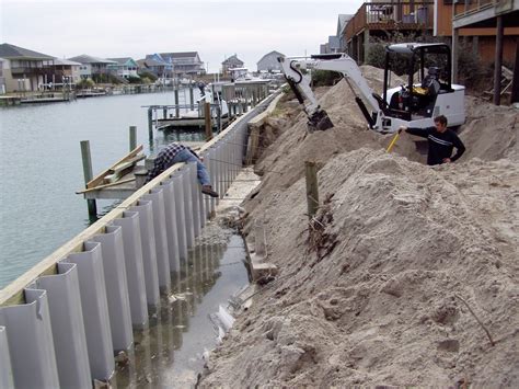 bulkhead retaining wall | Sea wall, Lake house, Retaining wall