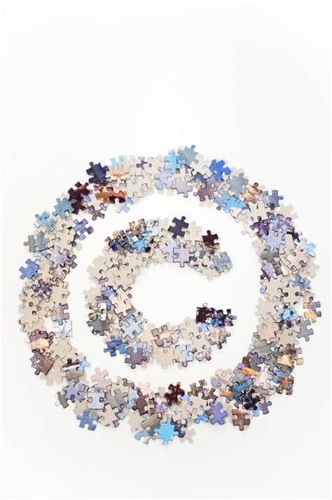 Copyright sign made of jigsaw puzzle pieces separated | Flickr