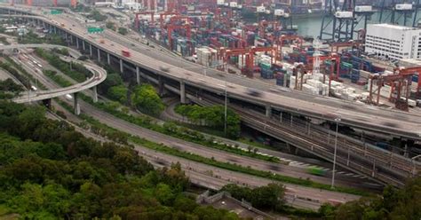 Hong Kong Container Port Terminal and Logistics Center Timelapse Pan Up ...