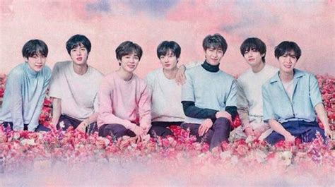 Download Cute Bts Group On A Pink Flower Field Wallpaper | Wallpapers.com