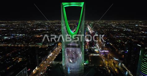 Drone photography of the Kingdom Tower in Riyadh, Saudi Arabia at night ...