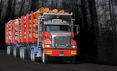Mills-Tui trailers carrying a mighty load of logs • Mills Tui