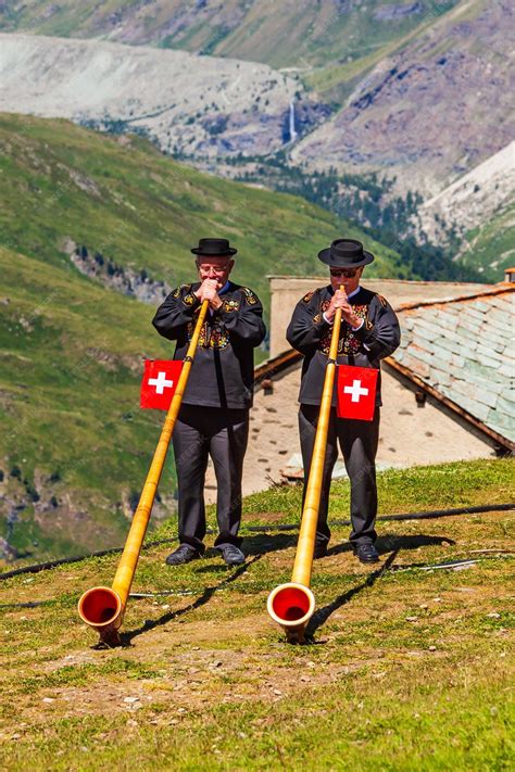 Premium Photo | Swiss alphorn blowers in switzerland