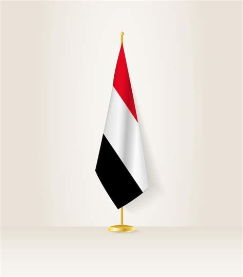 Premium Vector | Yemen flag on a flag stand