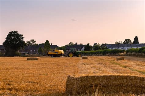 Premium Photo | Process of hay making during harvesting