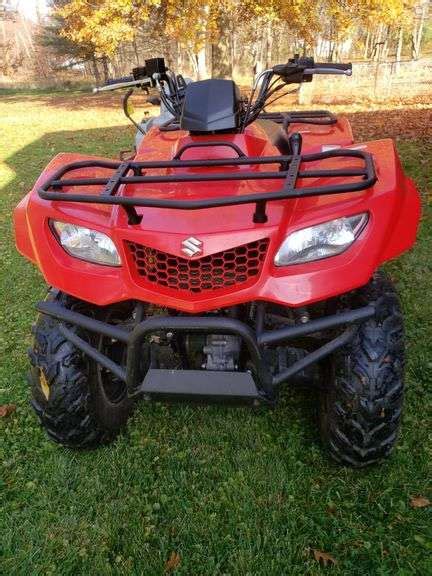 Suzuki 400AS King quad four-wheel drive ATV. Runs great. Believe to be 2010 model. Only 332 ...