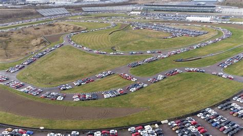 Rockingham: Ex-racetrack used to store thousands of vehicles - BBC News