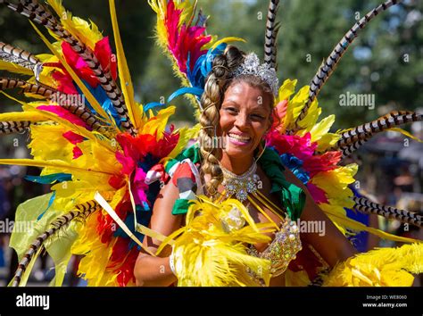 Colourful costumes at the Notting Hill Carnival which celebrates Caribbean culture. It attracts ...