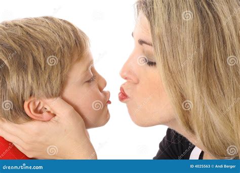 Kid kisses stock image. Image of family, love, parents - 4025563