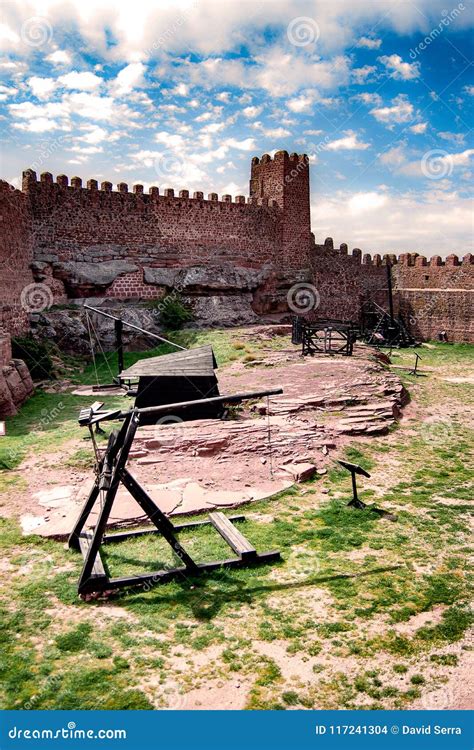 Castle on Mountain and Medieval Siege Weapons Stock Photo - Image of fortified, black: 117241304