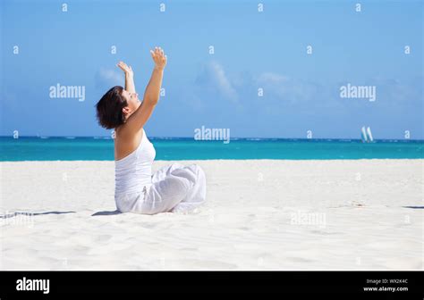 meditation on the beach Stock Photo - Alamy