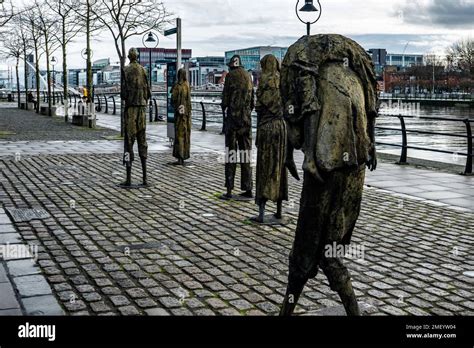 The Famine Memorial, on Custom House Quay, Dublin, Ireland. The sculpture shows emaciated people ...