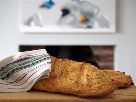 a loaf of bread sitting on top of a wooden table