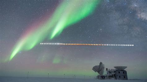 South Pole aurora dances around total lunar eclipse in stunning ...